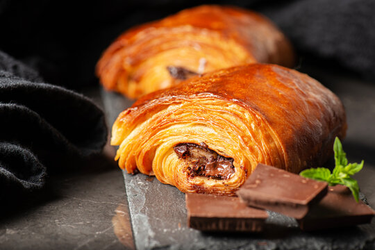 Delectable golden brown baked Pain au chocolat.