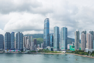 Fototapeta na wymiar Panorama of harbor and skyline of Hong Kong city