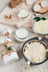 Basic set for home-made natural white eco soy wax candles in glass, wick, perfume. Idea for a hobby, business. Making trendy diy candles without harm to health on white background.