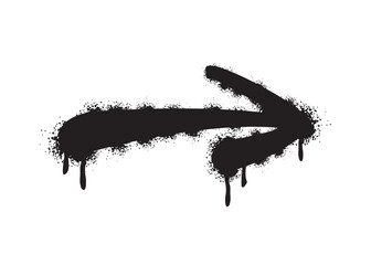 Graffiti arrow with overspray in black over white
