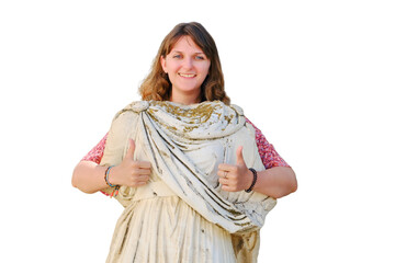 The woman shows an approving gesture with thumb up on the background of ancient statues, isolated...