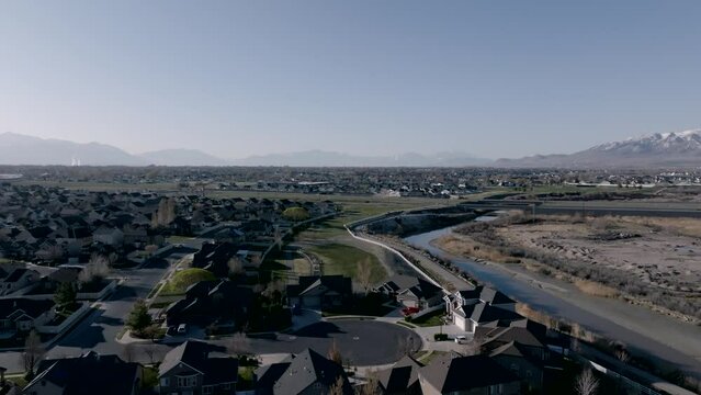 Aerial approach of a typical home in a Lehi, Utah suburban neighborhood