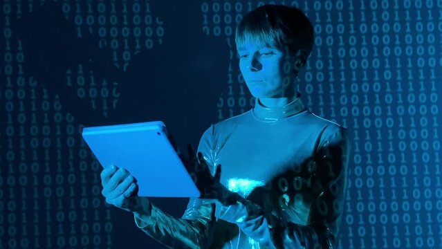Young adult woman programmer software developer working on digital tablet with computer code. Female silhouette render animation green binary code projection on background. AI, ICT, IT, IoT concept