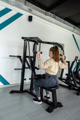 Young women do sports outside the house and train in the gym.