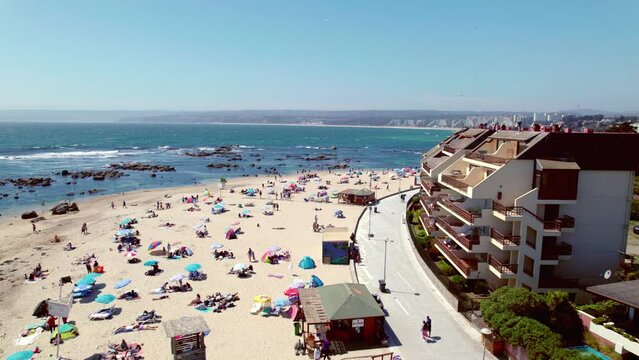 Aerial Drone Fly Above White Sand Beach and Pristine Blue Sea Water of Pejerrey Algarrobo, People relaxing at Chile Travel and Tourism Summer Destination