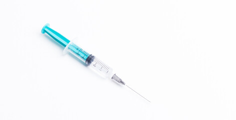 Disposable plastic syringe prepared for injection and vaccination in the hospital. The concept of medicine and health