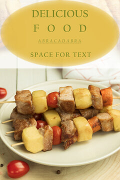 A dish of meat with potatoes and vegetables