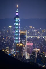 Papier peint photo Séoul Fantasy blue sky. The vibrant and bustling night scene of Taipei City. Night view of the city surrounded by mountains is hazy and dreamy. Dajianshan, Taiwan  © twabian