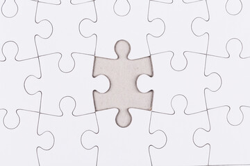 white puzzle jigsaw close up