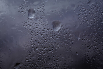 Drops of rain on glass