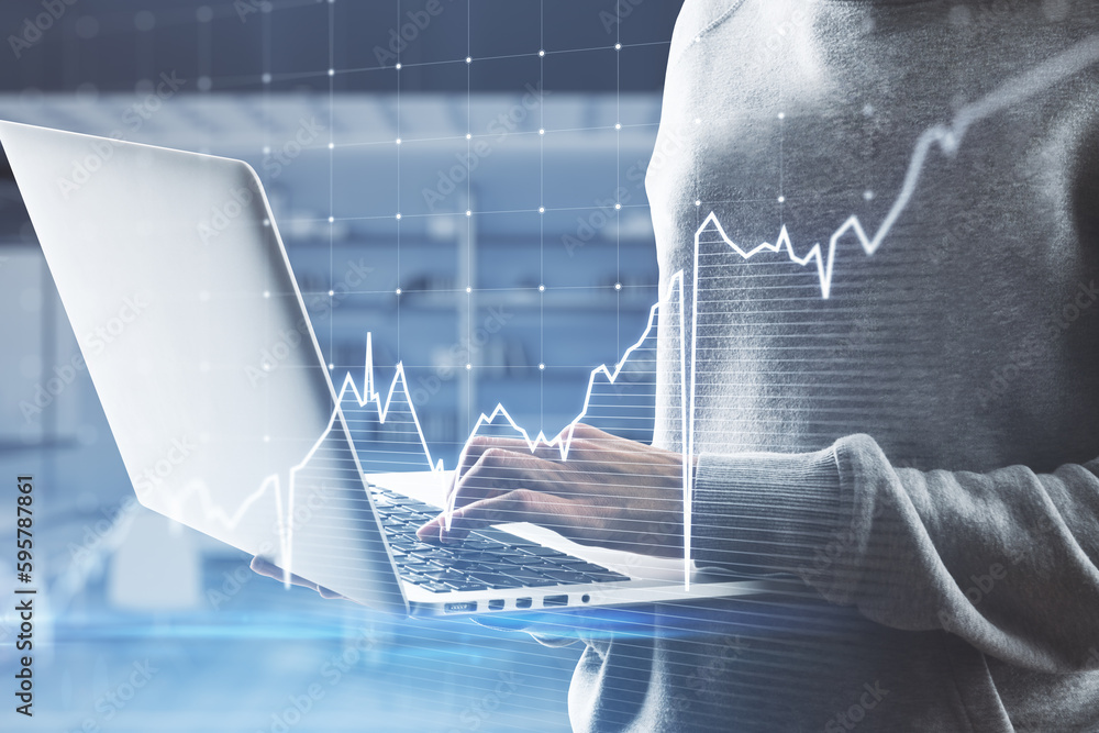 Poster close up of hacker hands using laptop with growing blue financial forex chart on blurry office inter