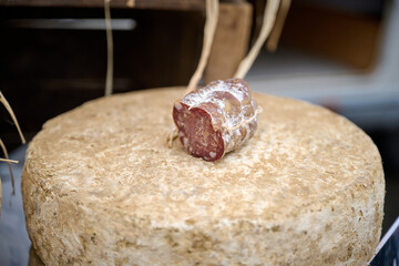 Dried meat on a wooden block on a farmer's market