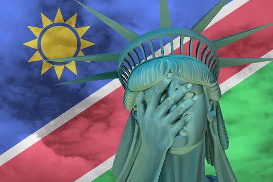 Statue of Liberty. Facepalm emoji on background in colors of Namibia flag