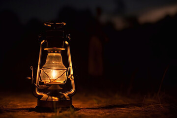 Old kerosene lamp at night. AI Generated