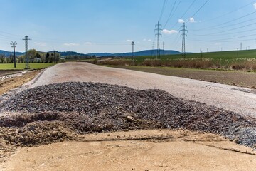 The construction site of the new road in the Czech Republic near the village "Cebin". Preparation of the territory for laying new asphalt.