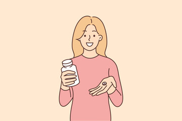 Woman is holding pack of vitamins and capsule of medicine that relieves headache or relieves depressive mood