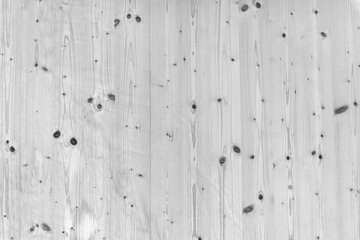 Black and white image of pinewood board surface