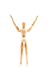 Dummy with raised arms celebrating success on white background. Concept of success