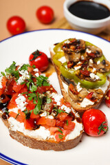 Toasts with tasty grilled vegetables, concept of delicious appetizer