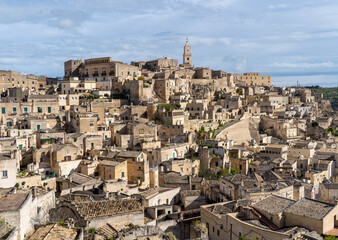 Naklejka premium Matera, Italy. Amazing view of the Sassi of Matera. Landscape of the historical part of the town. An Unesco World Heritage Site. Touristic destination