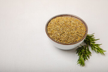 Dried rosemary and branches of fresh rosemary on a white texture background. Spicy spices. Seasoning for meat and fish. Cooking concept. RECEPT. Close-up. place for text.