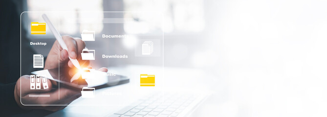 Online documentation database and document management system concept, Businessman using a tablet or computer, Document Management System and Automation software to archiving and efficiently manage.