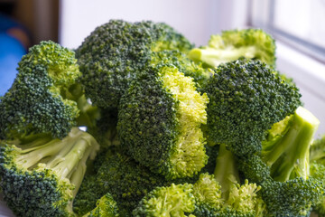 Raw broccoli in a dish close-up. Fresh broccoli.