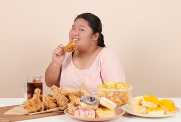 obesity young women binge eating disorder concept with woman eating fast food burger, fired chicken...