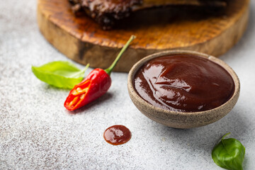 Barbecue sauce in a saucer