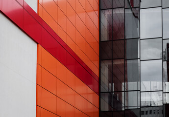 aluminum facade with red and panels