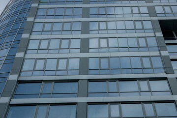 Plakat modern office building with glass windows