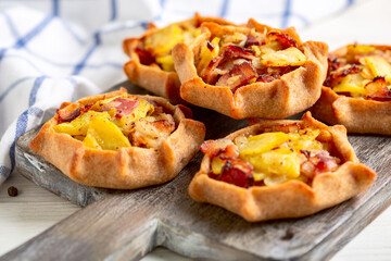 Traditional open pies (kalitki) close up.