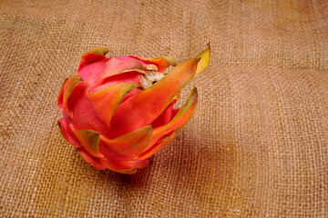 Healthy dragon fruits or pitaya isolated on texture background.