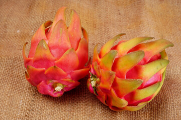 Healthy dragon fruits or pitaya isolated on texture background.