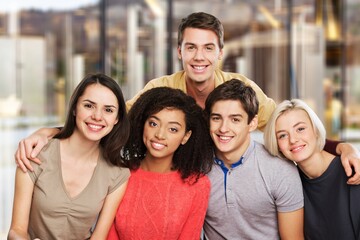 Happy group of young university students.