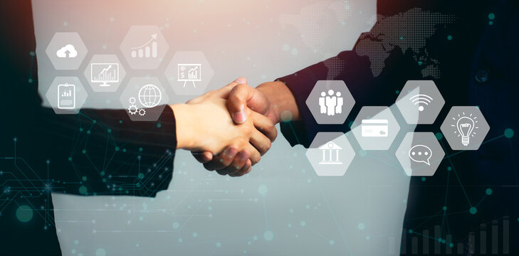 Businessman and Businesswoman making handshake for successful business, investment deal teamwork and partnership business partners. Business and Technology.