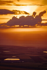 Fototapeta na wymiar a stunning sunrise over israel's landscapes with fields and village
