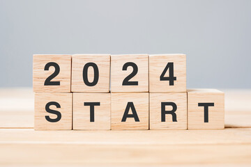 2024 START text on table. Resolution, strategy, goal, motivation, reboot, business and New Year holiday concepts