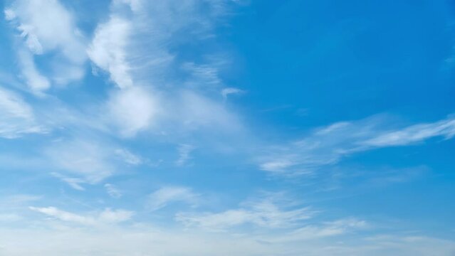 Cirrus clouds in the blue daytime sky. timelapse