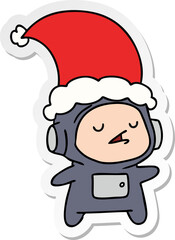 hand drawn christmas sticker cartoon of kawaii astronaut