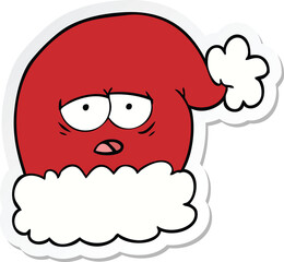 sticker of a cartoon christmas santa hat with tired face
