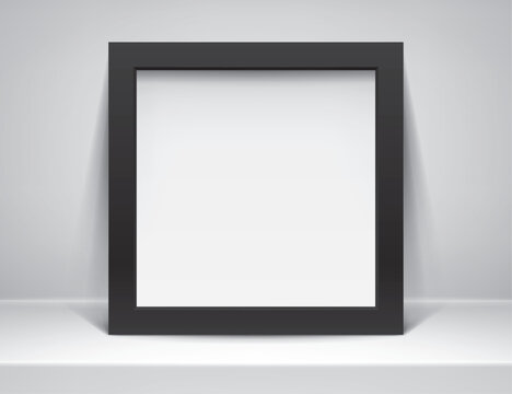 Realistic empty black frame on light background. Table surface. Border for your creative project, mockup for you business project. Vector design