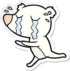 sticker of a cartoon crying polar bear