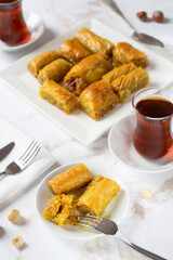 BAKLAVA. Traditional Turkish Desserts Baklava with Turkish Tea. Crispy walnut baklava