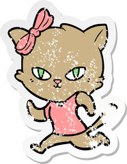 Obraz na płótnie Canvas distressed sticker of a cute cartoon cat jogging