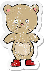 retro distressed sticker of a cartoon cute teddy bear