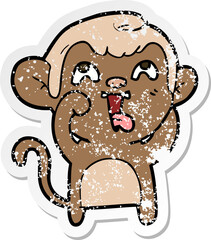 distressed sticker of a crazy cartoon monkey
