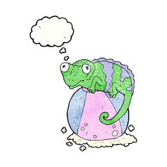 freehand drawn thought bubble textured cartoon chameleon on ball