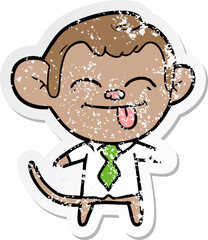 distressed sticker of a funny cartoon monkey wearing shirt and tie