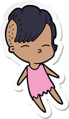 sticker of a cartoon squinting girl
